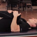 Knee to chest stretch helps promote range of motion and flexibility to the lower back and hips