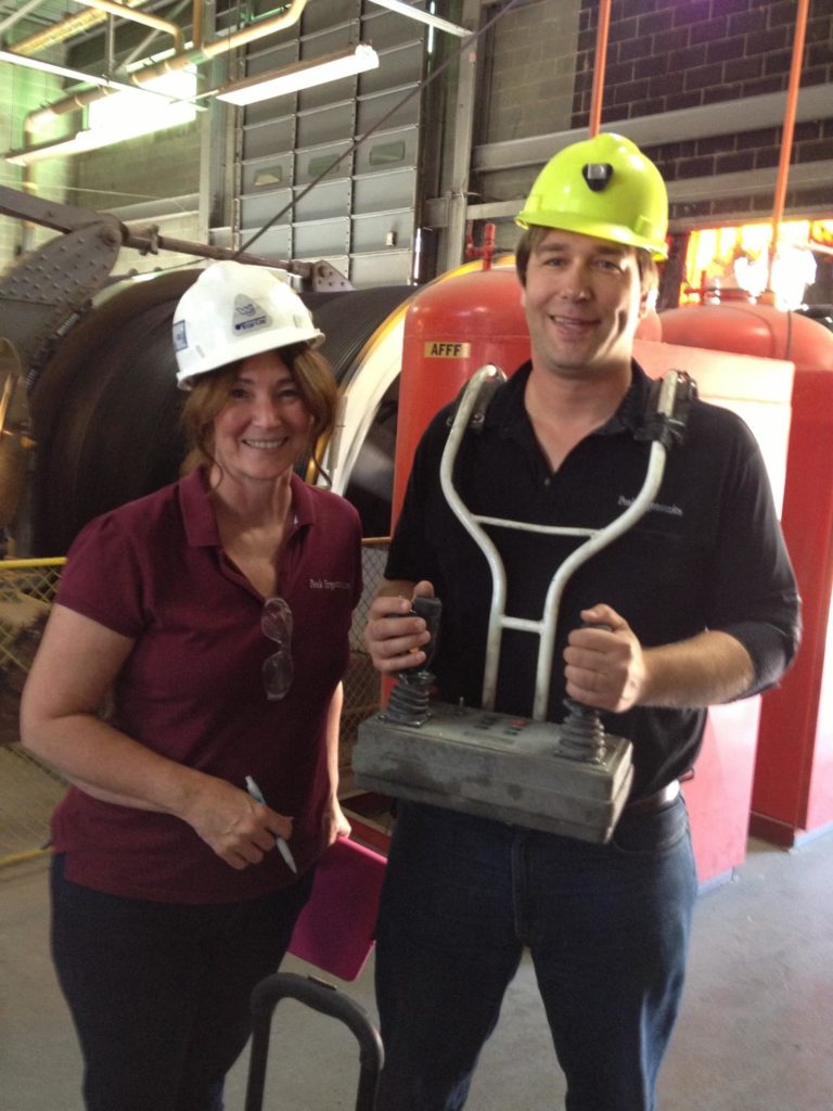 Kelly and Paul with Peak Ergonomics wearing safety gear